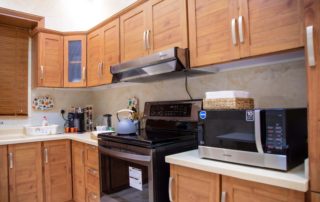 5 tips to clean the gunk and grime from your kitchen cabinets.